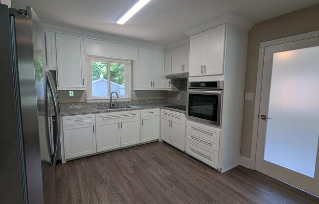Ranch with Fence and 20x30 Garage/Workshop with Electric Close to Light Rail