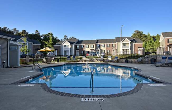 A swimming pool with the words "5 IN NO DIVING" written on the side.