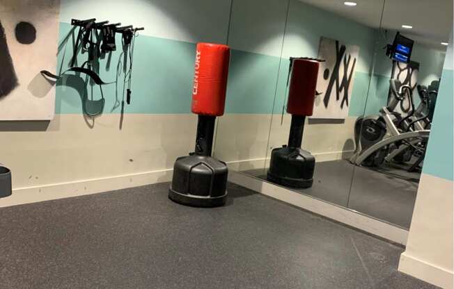 a bowling alley in a museum with bowling pins on the walls