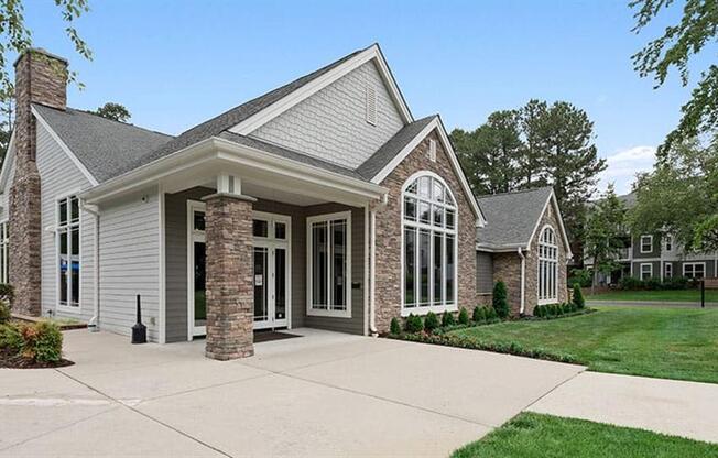 a house with a driveway and lawn at Trails at Short Pump Apartments, Richmond ,23233
