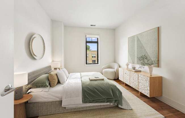 A bedroom with a bed, a chair, and a painting on the wall.