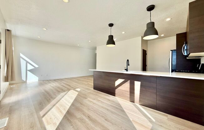 4-Bedroom Midvale Townhome | Garage + Pets Allowed + Great Location