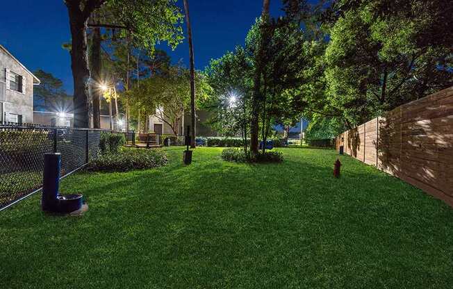 Community Dog Park with Agility Equipment at Arbors at Orange Park Apartments located in Orange Park, FL.