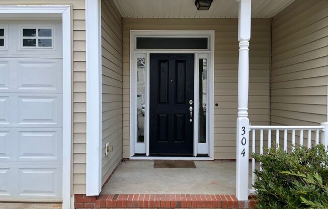 Updated Townhome with Garage & Screened in Porch