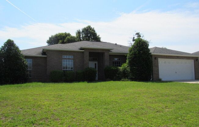 Four bedroom home near Whiting Field!