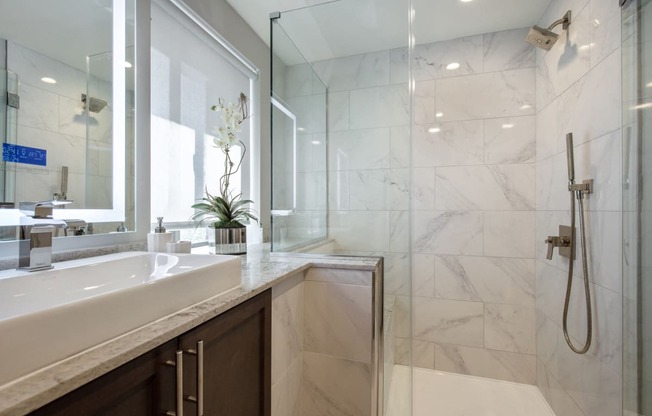 Lever-Style Door and Faucet Handles In Bathroom at Park Heights by the Lake Apartments, Chicago, 60649
