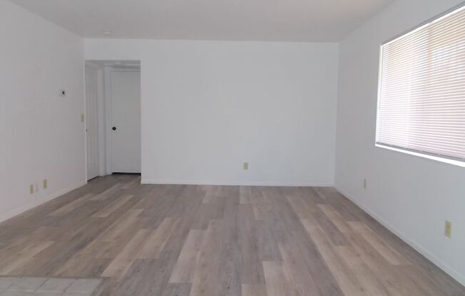 Charming Upstairs Condo with Private Balcony