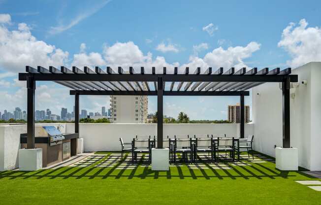 Apartments in Miami for Rent - MB Station - Outdoor Grill Station and Dining Table for Twelve Surrounded by Meticulously Groomed Grounds