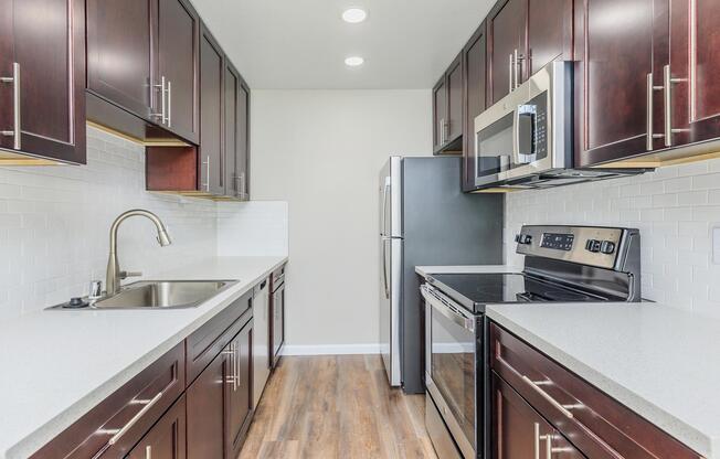 a modern kitchen with stainless steel appliances
