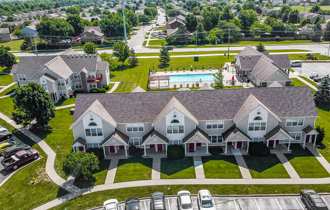 Aerial View Of Apartment Homes Overlooking The Pool & Sundeck