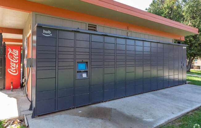 A dark grey garage door with the word Hub on it.