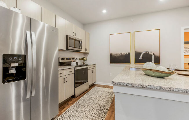 Kitchen with Granite Countertops and Stainless Steel Appliances