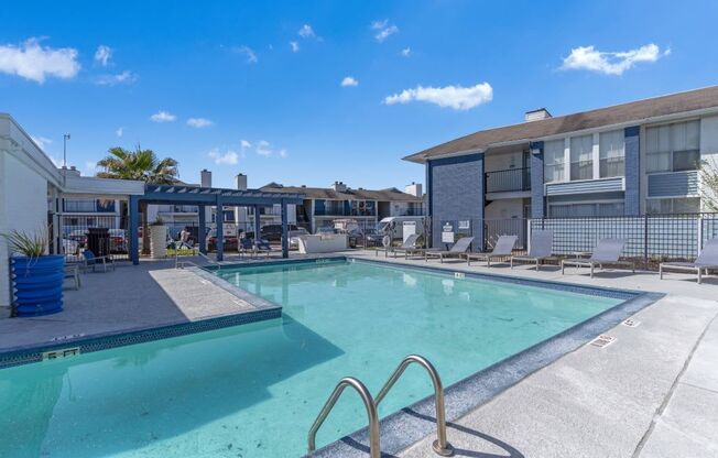 the swimming pool at the clubhouse at windsor apartments