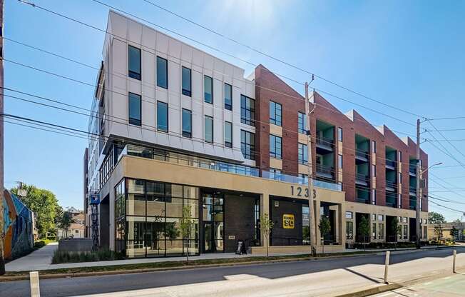 an image of the front of a building with a blue sky in the background