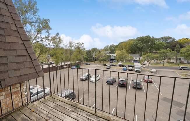 the view of the parking lot from the balcony