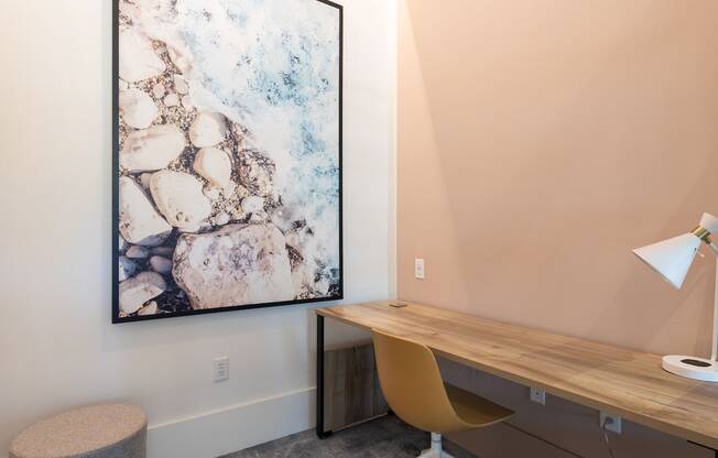 Micro office suite with desk, chair, and lamp