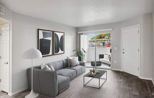 a living room with a couch and a table