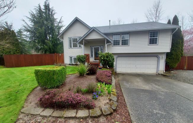 4 bedroom 2.75 bath, Huge Fenced Yard with Landscaping Included!!