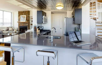 Stylish Kitchen With Bar Stools at Grand Adams Apartment Owner LLC, Hoboken, 07030