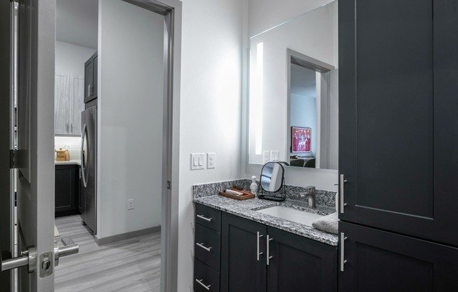 Unwind in our designer bathrooms, complete with quartz countertops and backlit mirrors.