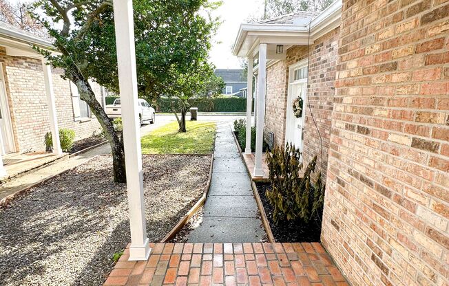 Uptown Rental: 2BR Duplex with Parking & Yard