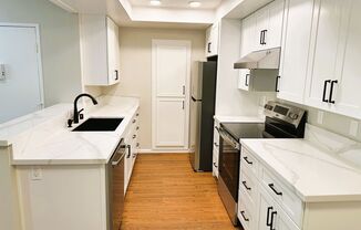 Fully Remodeled Second Story Condo with Laundry and Garage