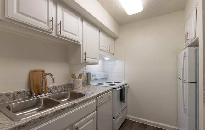 This is a photo of the kitchen in the 472 square foot 1 bedroom, 1 bath apartment at Princeton Court Apartments in the Vickery Meadow neighborhood of Dallas, Texas.