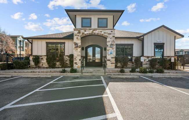 A building with a stone archway entrance and a sign that reads "1800" on the right side.