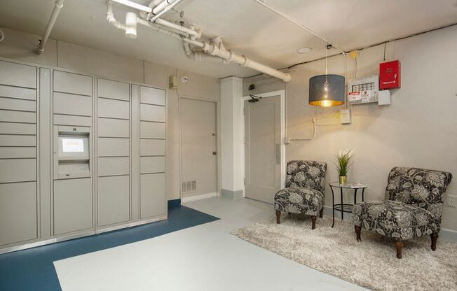 Image of Laundry Room with Cozy Chairs and Package Receiving Lockers at Stockbridge Apartment Homes, Seattle, Washington