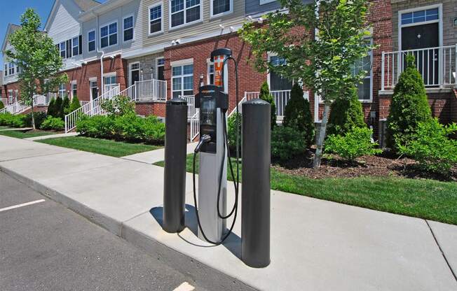 a pair of charging stations in front of a building