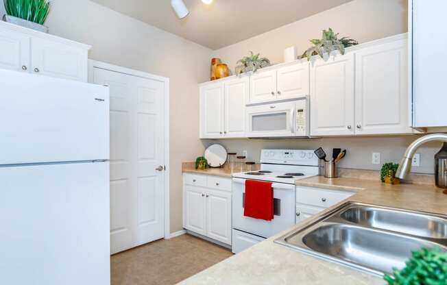 white appliances at The Paseo by Picerne, Goodyear, AZ, 85395