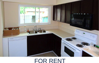 Spacious 3-Bedroom Split-Level Home with Large Deck and 2-Car Garage