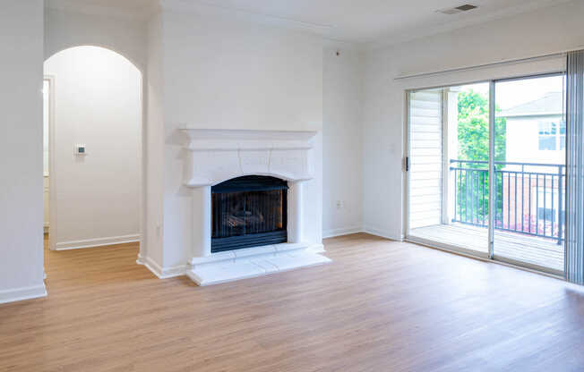 Living Room with Balcony and Fireplace