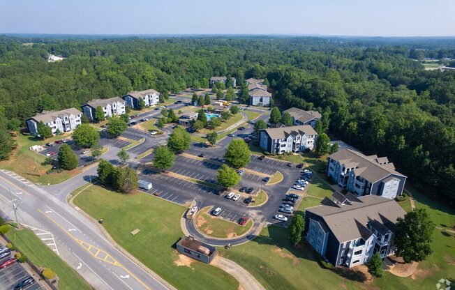 an aerial view of a neighborhood with houses and roads