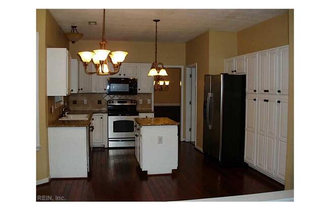 BEAUTIFUL UPDATED HOME WITH FENCED BACKYARD WITH DECK