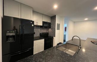 MOVE-IN READY 1+1 w/gated entry, 2 parking spaces + pool!