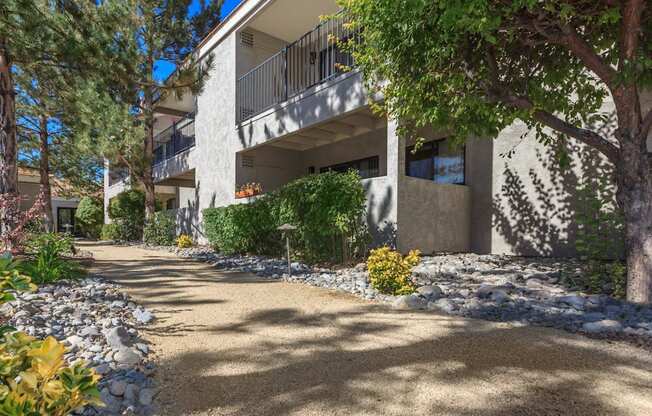 Sagecliff Apartments Shaded Walkway and Landscaping