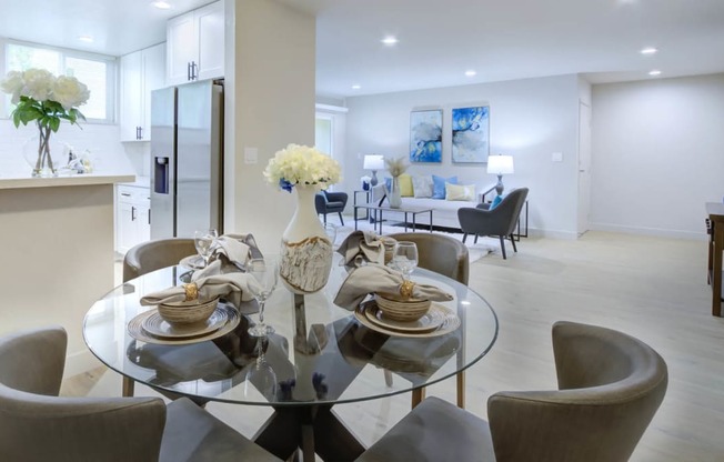 a kitchen and dining area in a 555 waverly unit