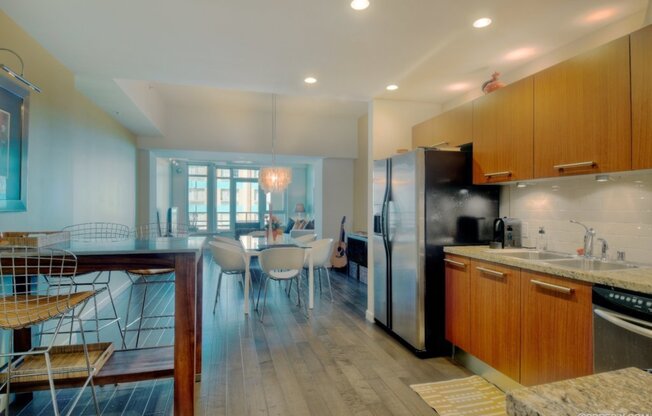 Spectacularly Upgraded, Fully Furnished Breeza Townhome style Condo