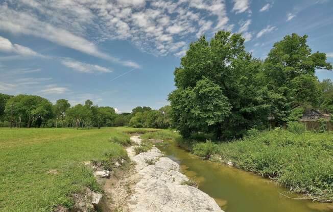 Creek at The Villas at Quail Creek Apartments in Austin Texas June 2021