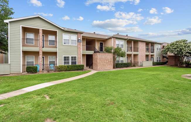 our apartments at the district feature a spacious yard and green grass