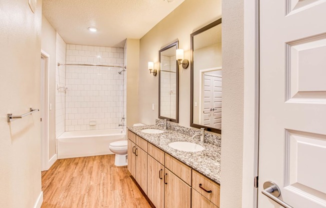 Bathroom with Designer Granite Countertops at The Parker at Maitland Station in Maitland, FL