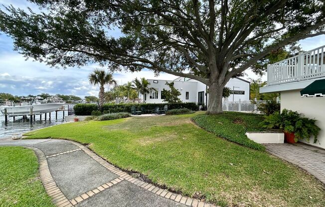 Classic waterfront Snell Isle Estates 3 Bed 2.5 Bath Home with private dock!