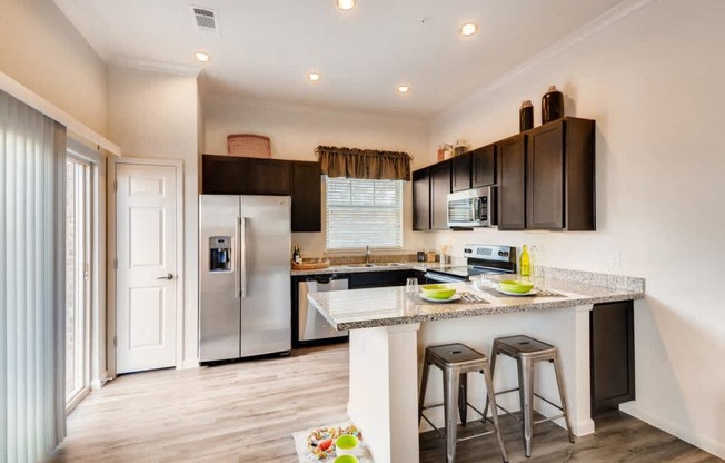 Gourmet Kitchen With Island at Avilla Northside, McKinney, 75071