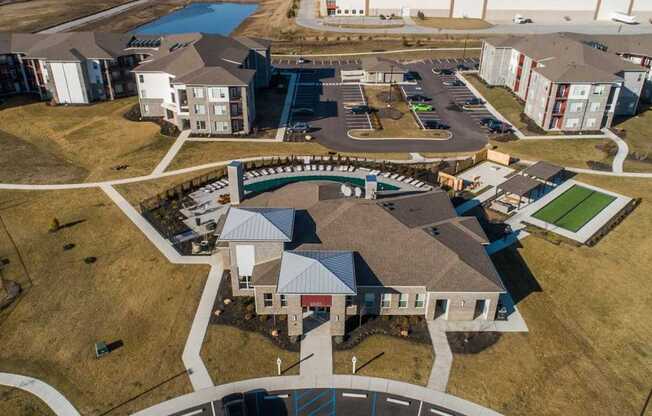 Aerial shot of the club house and amenities at Echo Park at Perry Crossing Apartments, Indiana, 46168