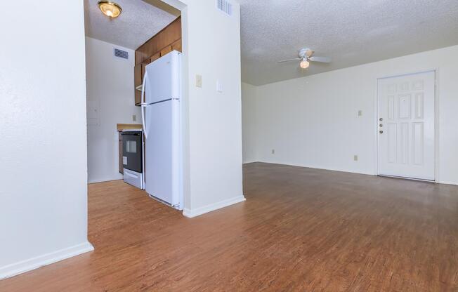 a kitchen with a wooden floor