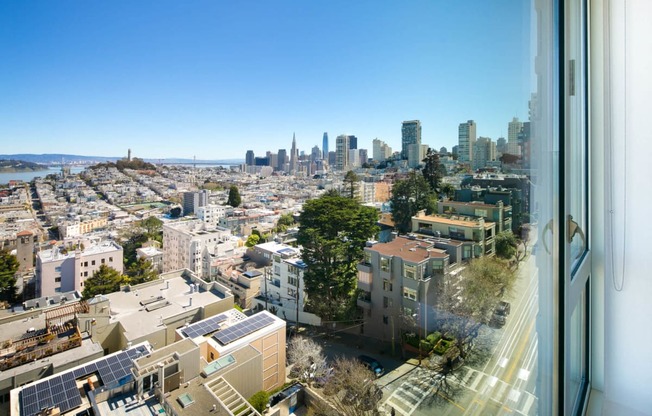a view of the san francisco skyline from the apartment