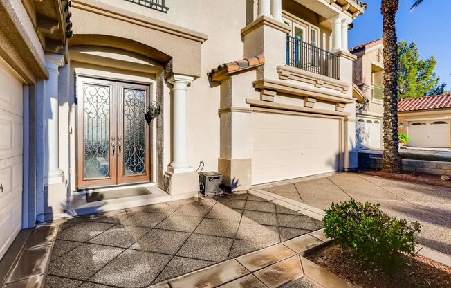 Highly Upgraded Home on the Golf Course with Strip Views in Seven Hills