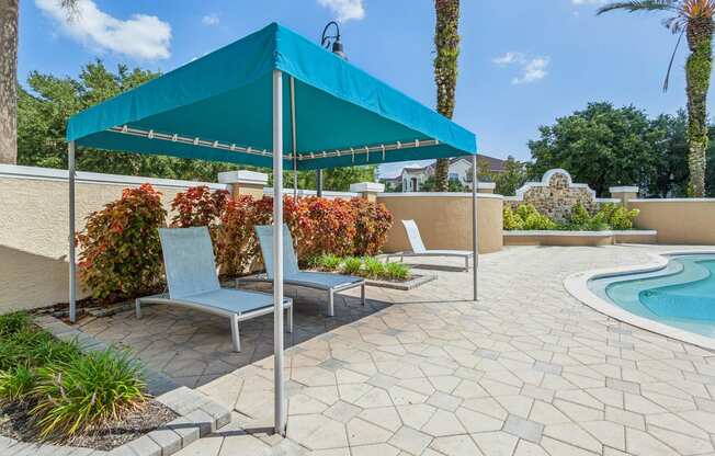 patio with lounge seating at Grandeville on Saxon apartments in Orange City, Florida