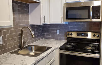Kitchen with appliances at GEORGETOWN PARK, Georgetown